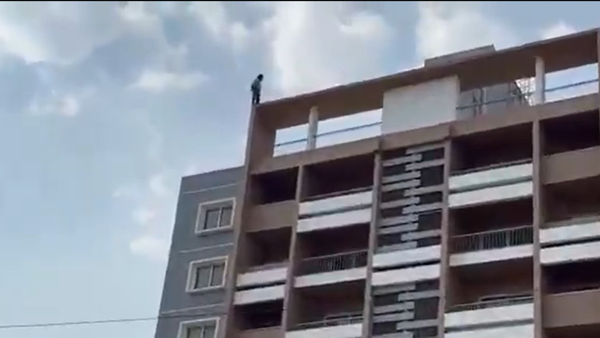 4-hour drama: Pocso accused climbs 9-storeyed building in Bengaluru, demands ‘justice’ - watch