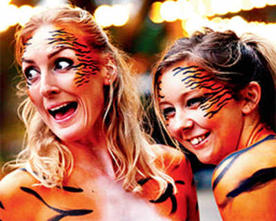 Stripping for a cause: Hundreds run naked to raise save-tiger funds