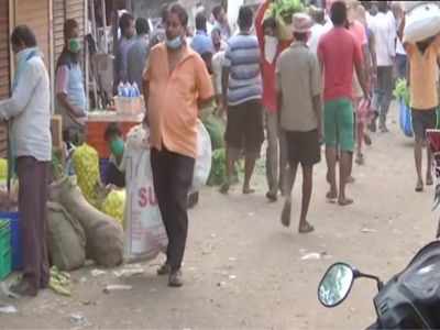 Locals flout the rules of social distancing in Dadar market