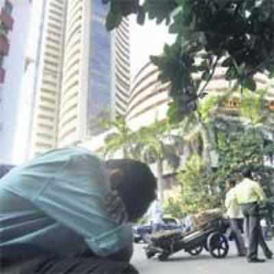 Sensex plummets below 9,000 pts