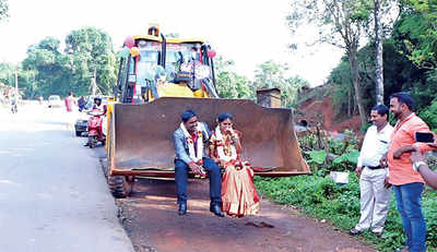 Video: This couple in Puttur took an earth excavator to their wedding venue
