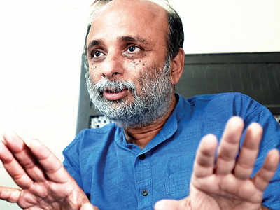 Mumbai University Economics professor Neeraj Hatekar says politics, ambition behind inquiry