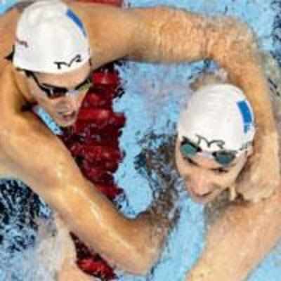 French dead heat for men's 100 backstroke gold