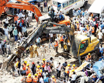 Three BMC officials arrested for Dockyard Road building collapse