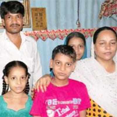 One year later, orphanage boy reunited with parents