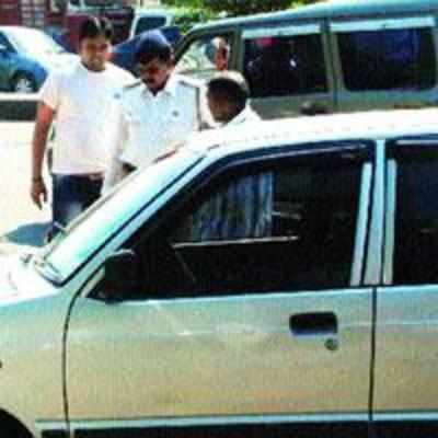 Traffic cops intercepting vehicles with press, police, Indian armed forces' stickers