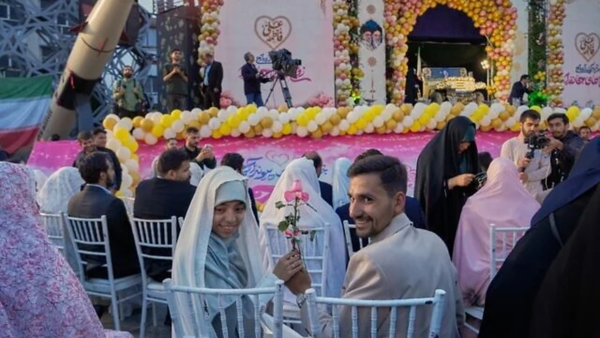 Iran stages mass weddings for couples ready for war 'sacrifice'