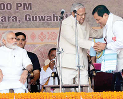 Sonowal takes charge