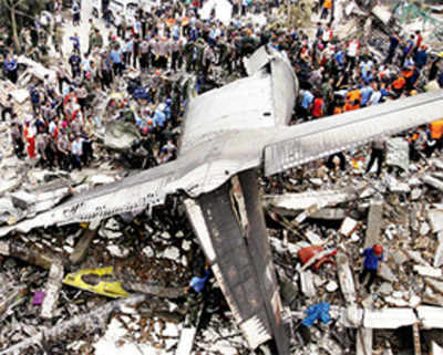 Indonesian plane crashes into city, 116 feared dead