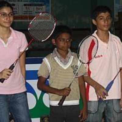 Young badminton players shuttle away
