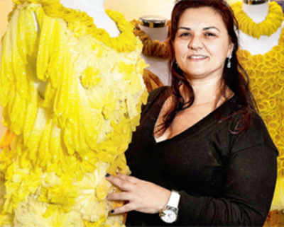 Designer showcases gowns made from condoms