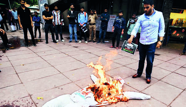 NSUI city unit protests Rahul’s disqualification from Parliament