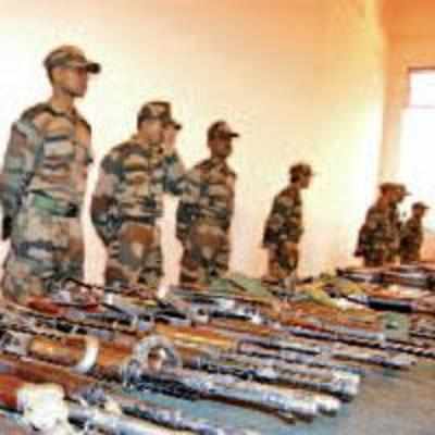J&K cops recover huge cache of arms in forest