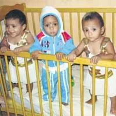 Parents of quadruplets take bank loan for first birthday
