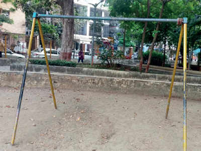 Missing swings greet children at this park
