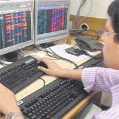 Sensex breaches 15,000 mark