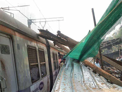 Piling machine collapses on train at Currey Road rly stn