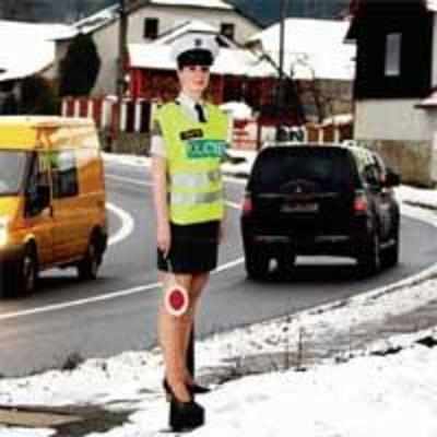Czechs deploy cardboard cops in miniskirts