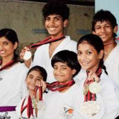 Six city kids win karate medals Down Under