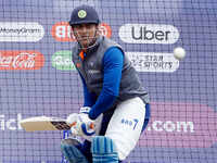 MS Dhoni trains with team following glove controversy 