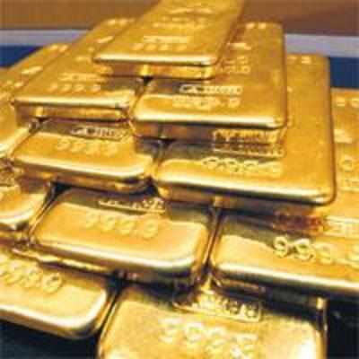 Gold recedes from record price levels