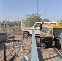 Chaos at Bhopal bridge: Bolero slams auto, then hangs dangerously over the edge