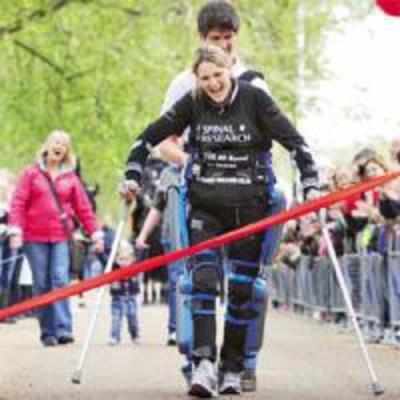 Paralysed mom finishes marathon in 16 days