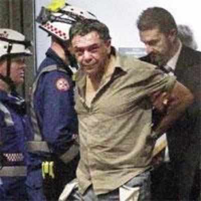 Man holds Sydney hostage in 12-hour '˜bomb' siege drama