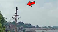 Dangerous stunt! Boy jumps into river from electric pole in Kanpur 