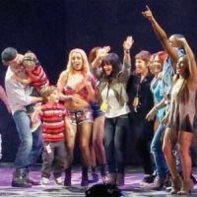 Kids join mum Britney on stage, match steps