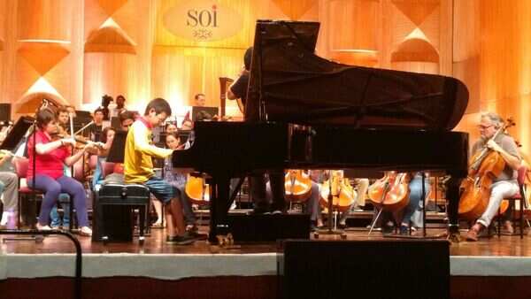 12-year-old pianist plays with city orchestra in 10th year celebrations