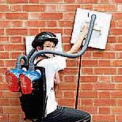 Spiderboy makes wall-climbing gadget using vacuum cleaners