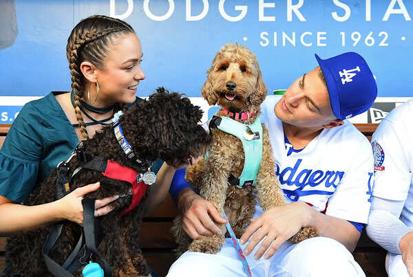 Kiké Hernández and his wife Mariana Vicente share a heartfelt birthday moment with their beloved pet Arizona