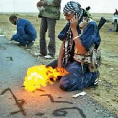 Gaddafi men fire cluster bombs; US accepts stalemate on ground
