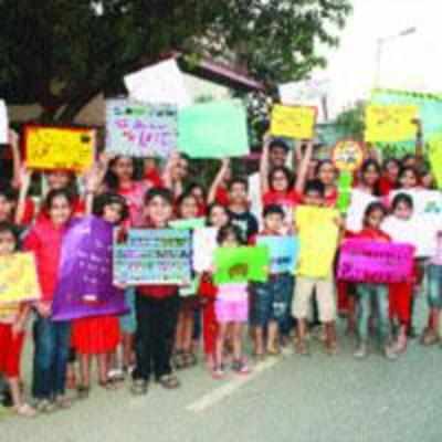 Kids take to the streets to create traffic awareness
