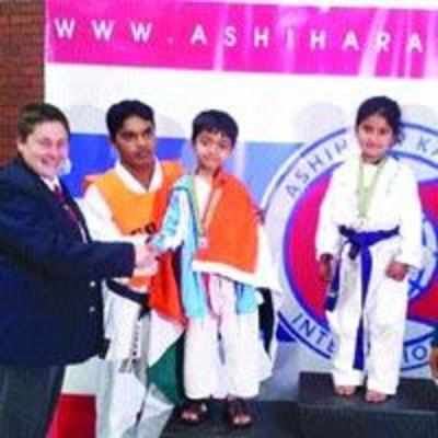 Five-year-old boy claims silver at int'l martial arts tourney