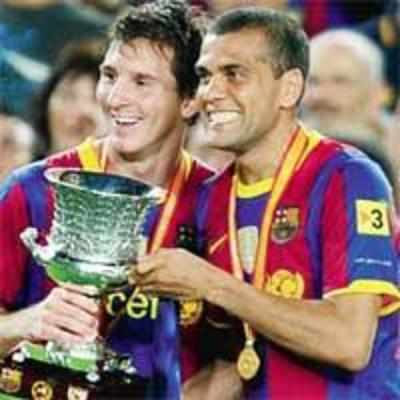 Messi hat-trick leads Barca to Super Cup glory
