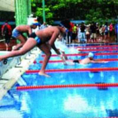 City i-school swimming sees old guards shining