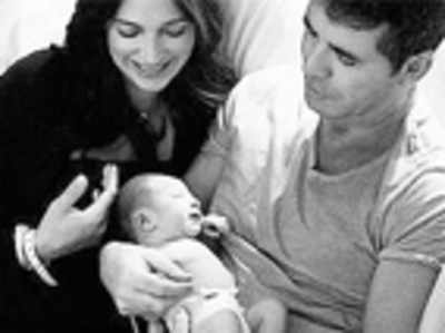 Simon shares first pictures of his newborn son