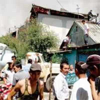 Uzbek villages burnt, scores slaughtered