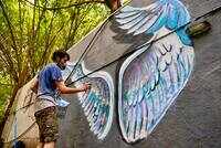 City-based artist on a mission to paint 100 walls across the city! 