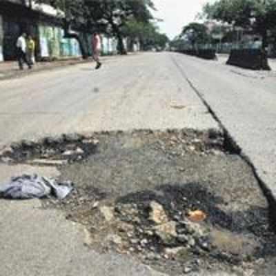 Potholes filled, claims BMC. We can see that!