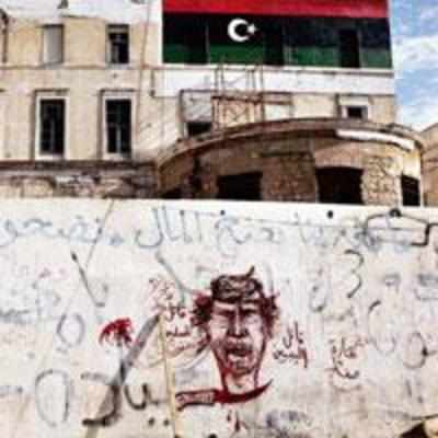 Coalition forces raid Gaddafi stronghold