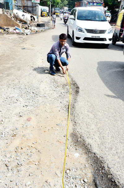 BBMP says only 529, we found 180 potholes on just two roads