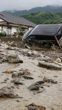 <i class="tbold">torrential</i> rains in southwest Japan