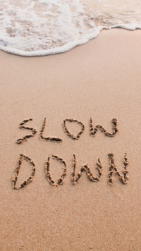 SLOWING <i class="tbold">down</i> is the key to health and joy