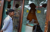 Mobs <i class="tbold">torch</i>ed an eatery and vandalised shops
