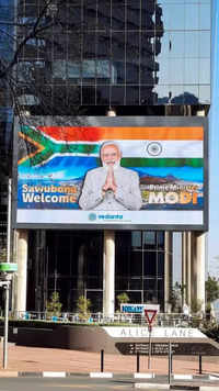 SA welcomes global leaders; tall screens ft PM Modi erected