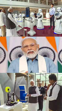 PM Modi visits robot exhibition, inaugurates <i class="tbold">vibrant gujarat global summit</i>