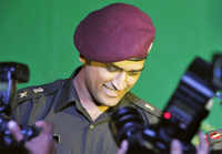 New pictures of <i class="tbold">army captain</i>